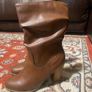 Light brown zip up shin high boots, size 7 1/2, lightly used.